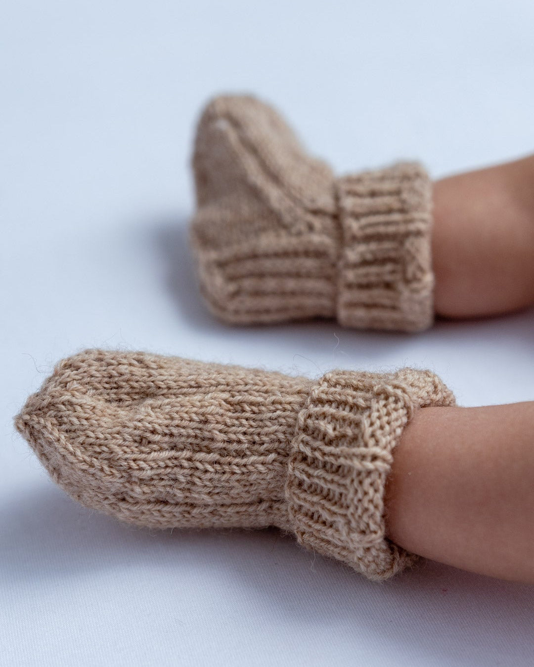 Stricksocken für Neugeborene